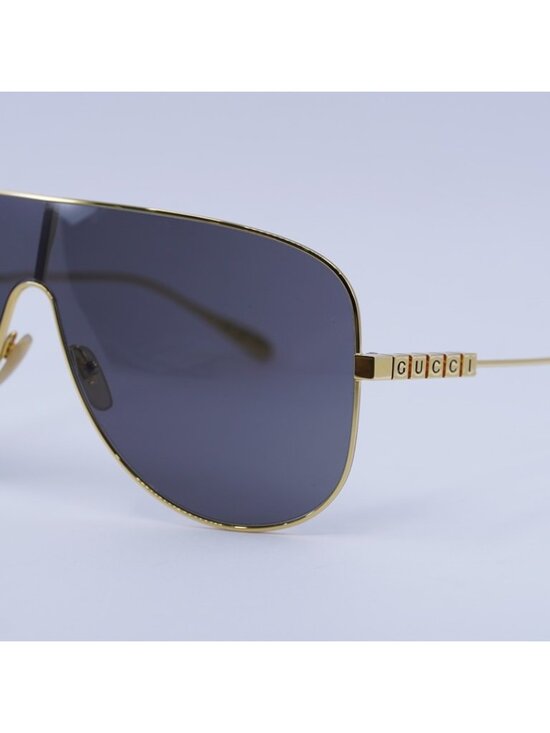 Gucci GG1436S 001 Sunglasses Yellow Gold Shield Frame, Grey Lenses main image 10